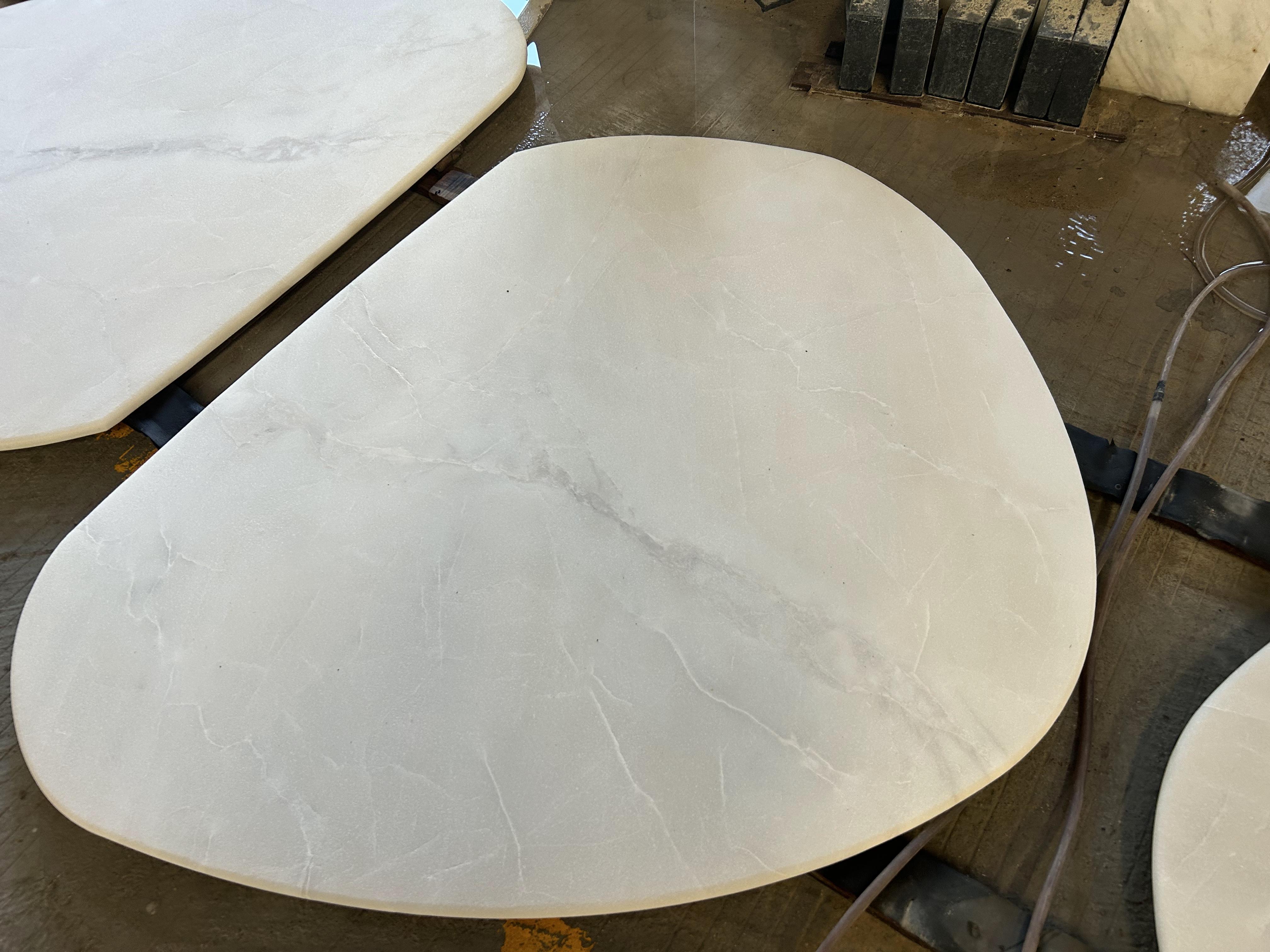 Kali Ice white onyx tables